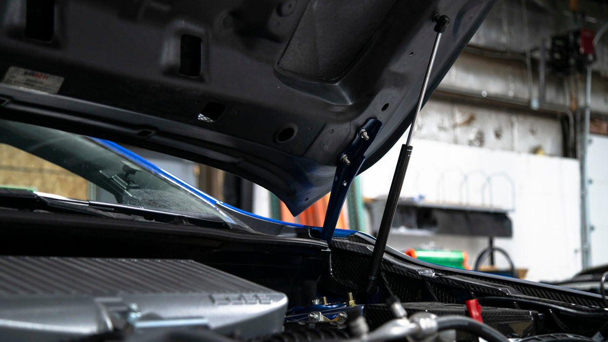 OLM Carbon Fiber Wrapped Hood Struts - 2022+ WRX
