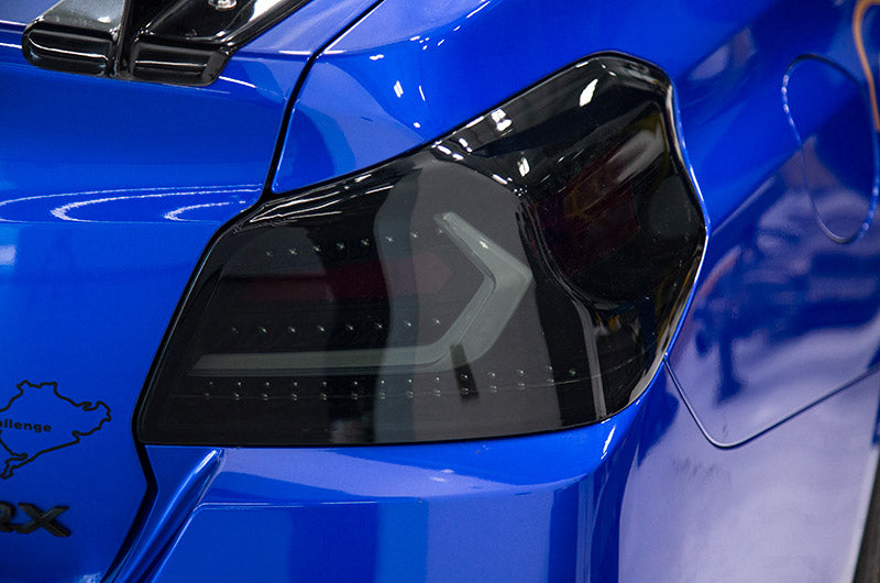 OLM Evolution Tail Lights (Smoked Lens, Black Base, White Bar) - 2015-2021 WRX / STI