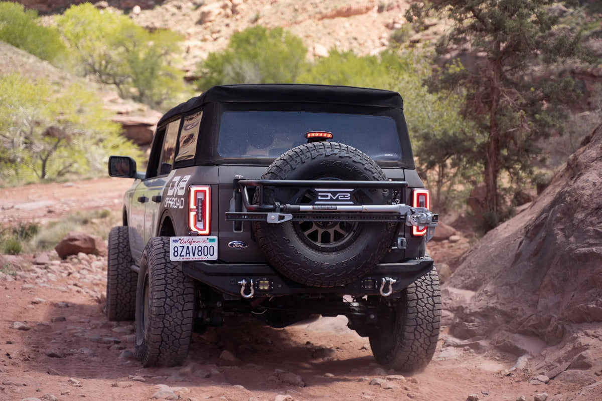 DV8 - DV8 Offroad 21 - 23 Ford Bronco Spare Tire Guard & Accessory Mount - Panda Motorworks
