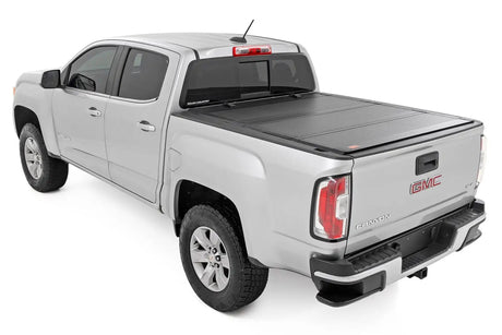 Rough Country - Rough Country Hard Tri - Fold Flip Up Bed Cover Chevy/GMC Canyon/Colorado (15 - 24) - Panda Motorworks