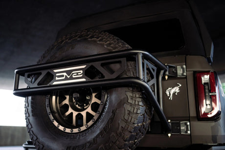 DV8 - DV8 Offroad 21 - 23 Ford Bronco Spare Tire Guard & Accessory Mount - Panda Motorworks